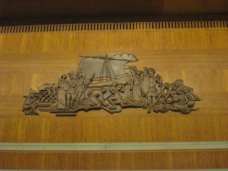 Queen Mary 2010 0480.JPG - Carvings around the room. Depict different periods in sailing.